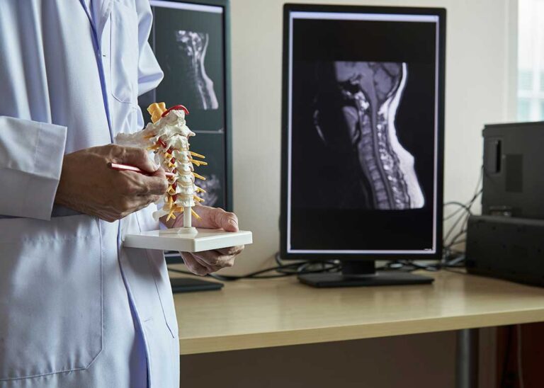 A practitioner discussing treatment options with an adult patient in a calm clinic setting.